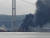 28일 울산 광역시 염포부두 인근 선박에서 화재가 발생해 검은 연기가 솟구치고 있다. [사진 독자=연합뉴스]