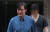 조국 법무부 장관과 아들 조모씨가 22일 오후 서울 서초구 방배동 자택을 나서고 있다. [뉴스1]