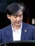 조국 법무부 장관이 출근을 위해 4일 오전 서울 방배동 자택에서 나오고 있다. 이날 법제처 국감에서도 야당 의원들의 조국 장관 관련 질문이 쏟아졌다. [뉴스1]