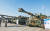 Seoul ADEX에선 한국형 첨단 무기의 위용을 확인할 수 있다. 2년 전 행사에 전시된 K2 전차와 K55A1 자주포의 모습.