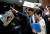 캐리 람 홍콩 행정장관이 16일(현지시간) 입법회 시정연설을 위해 입장하자 야당 의원들이 시위를 벌이고 있다. [로이터=연합뉴스