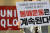 21일 오후 서울 유니클로 광화문점 앞에서 평화나비네트워크와 대학생겨레하나 회원들이 유니클로 광고 규탄 기자회견을 하고 있다. [뉴스1] 