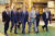 문재인 대통령이 24일 오후 군산시 (주)명신 프레스 공장에서 열린 ‘전북 군산형 일자리 상생협약식’에 참석하기 위해 참석자들과 입장하고 있다. (청와대 제공) [뉴스1]