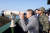 황교안 자유한국당 대표가 24일 강화도 말도소초를 방문해 망원경으로 함박도를 보고 있다. [국회사진기자단]