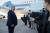 도널드 트럼프 미국 대통령이 28일(현지시간) 미국 워싱턴 인근 앤드루스 공군기지에서 에어포스원에 탑승하기 직전 기자들과 만나 &#34;중국과의 무역합의 서명이 예정보다 빨라질 수 있다&#34;고 말했다. [AP=연합뉴스]