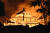 31일 새벽 세계유산으로 등재된 일본 오키나와현의 슈리성터 정전에 발생한 화재로 건물이 불타고 있다. [트위터]