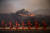 소방관들이 30일(현지시간) 캘리포니아 시미 밸리의 레이건 도서관 인근 화재 현장을 지나고 있다. [EPA=연합뉴스]