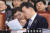 김오수 법무부 차관이 5일 오전 서울 여의도 국회에서 열린 법제사법위원회 전체회의에서 부처 관계자와 이야기를 나누고 있다. [뉴스1]