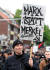 지난 5월 1일 독일 서북부 함부르크에서 열린 노동절 시위에서 한 참가자가 &#39;메르켈보다 마르크스가 낫다&#39;는 구호가 적힌 팻말을 들고 행진하고 있다. 독일의 실업난은 정치에도 영향을 미치고 있다. [로이터=연합뉴스] 