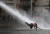 한 시위자가 물대포에 맞아 쓰러지고 있다. [REUTERS=연합뉴스]