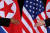 도널드 트럼프 미국 대통령과 김정은 북한 국무위원장이 지난해 6월 싱가포르에서 만나 악수하고 있다. [로이터=연합뉴스]