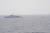 지난 6월 11일 속초 동북방 161km 지점(NLL 이남 약 5km 지점)에서 표류중인 북한 어선 1척을 우리 해군 함정이 발견해 예인하고 있다. [사진 합참]