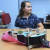  지난 19일(현지시간) 미 켄터키주 애슐랜드의 사바나 그리피스가 자신이 연주할 수 있게 개조된 우쿨렐레를 들고 연주를 하고 있다. [AP=연합뉴스]
