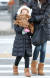 2일 오전 서울 종로구 광화문네거리에서 한 어린이가 두꺼운 외투, 목도리, 핫팩 등으로 완전무장한 채 발걸음을 옮기고 있다. [연합뉴스]