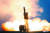 북한 김정은 국무위원장이 국방과학원에서 진행한 초대형 방사포 시험사격을 참관했다고 지난달 29일 조선중앙통신이 보도했다.[연합뉴스]