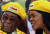 사치스런 생활로 &#39;구찌 그레이스&#39;로 불린 그레이스 무가베(오른쪽) 전 짐바브웨 영부인이 2017년 11월 짐바브웨 하라레에서 열린 행사에 참석해 남편 로버트 무가베와 대화를 나누고 있다. [로이터=연합뉴스]