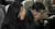 고 김민식 군의 부모 김태양(오른쪽)·박초희 씨가 10일 오전 국회 본회의장에서 민식이법이 통과되자 눈물을 흘리고 있다. 김경록 기자