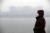 11일 오전 서울 서초구 잠원 한강공원에서 바라본 한남동 일대가 먼지로 뿌옇게 뒤덮여있다. [연합뉴스]