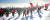 노동당 선전일꾼 행진대가 지난 10일 백두산을 전력질주로 오르고 있다. [노동신문=뉴스1]