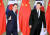문재인 대통령이 23일 중국 베이징 인민대회당에서 시진핑 중국 국가주석과 정상회담에 앞서 기념촬영을 한 뒤 회담장으로 이동하고 있다. [청와대사진기자단] 