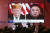도널드 트럼프 미국 대통령과 김정은 북한 국무위원장 사진이 나란히 걸린 행사장. [AP=연합뉴스]