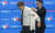 류현진이 28일(한국시간) 캐나다 온타리오주 토론토 블루제이스의 홈구장 로저스 센터에서 열린 공식 입단 기자회견에서 토론토 로스 앳킨스 단장이 입혀주는 유니폼을 입고 있다. [연합뉴스]