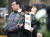 '돼지를 위한 추모식'에서 한 참석자가 '무차별 살처분 금지 방역정책 수립하라'는 문구가 적힌 손피켓을 들고 있다. [뉴시스]