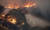 호주 소방 헬기가 지난 해 12월 31일 빅토리아 주 이스트기프스랜드에서 산불 진화 작업을 벌이고 있다. [AP=연합뉴스]