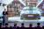  일론 머스크 테슬라 CEO가 7일 중국 상하이 기가바이트 테슬라 생산공장에서 열린 모델3 인도식에서 프리젠테이션을 하고 있다. [로이터=연합뉴스]