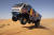 트럭 경쟁 부문에 출전한 러시아 드라이버들이 모래 언덕을 넘고 있다. [EPA=연합뉴스]