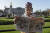 영국 왕실의 '빅팬'을 자처하는 존 로그리가 9일 영국 런던 버킹엄궁 앞에서 심각한 표정으로 '메그시트' 관련 신문 기사를 읽고 있다. [AP=연합뉴스]