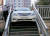지난 11일 오후 4시 45분쯤 부산 부산진구 감고개공원 계단에 끼인 30대 음주운전자의 차량. [사진 부산진경찰서]