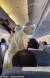  지난 12일(현지시간) 마카오 보건 당국 관계자들이 우한에서 출발해 마카오에 도착한 비행기 안에서 승객들의 발열 검사를 하고 있다. 20일 SNS에 공유됐다. [사진 트위터 캡처]
