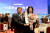 지난 2017년 12월 5일 코엑스에서 열린 '제54회 무역의날 행사'에서 '1억불 수출의 탑'을 받은 전 회장 부부 모습. [연합뉴스]