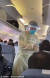 지난 12일(현지시간) 마카오 보건 당국 관계자들이 우한에서 출발해 마카오에 도착한 비행기 안에서 승객들의 발열 검사를 하고 있다. [사진 트위터 캡처]