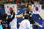 김진영(맨 위)이 아시아핸드볼선수권 4강전에서 일본 선수들의 견제를 뚫고 슈팅하고 있다. [EPA=연합뉴스]