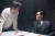 영화 '남산의 부장들' 촬영 현장에서 우민호 감독과 배우 이병헌(왼쪽부터). 두 사람은 5년 전 영화 '내부자들'로 700만 관객을 모은 데 이어 이번에 다시 뭉쳤다. [사진 쇼박스]