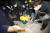 30일 오후 충북 진천군 한국교육과정평가원 주차장에서 한 주민이 진영 행정안전부 장관이 탄 차 앞에 누워 항의하고 있다. [연합뉴스]