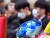 2019학년도 전기 한국해양대 해사대학 학위수여식이 열린 지난달 29일 오전 부산 영도구 한국해양대 대강당에서 마스크를 쓴 졸업생들이 행사진행을 지켜보고 있다. [뉴시스]