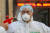  신종 코로나바이러스 감염증과 사투를 벌이고 있는 중국 우한의 한 의사가 소독받는 모습. [AFP=연합뉴스] 