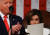 트럼프 대통령이 4일 상하원 합동의회에 참석해 국정연설을 하는 동안 낸시 하원의장이 트럼프를 노려보고 있다. [AFP=연합뉴스]