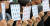 전북대 재학생들이 지난해 7월 19일 학내 학생회관 앞에서 기자회견을 열고 비리 교수의 징계와 재발 방지 대책을 대학본부 측에 촉구하고 있다. [뉴스1]