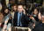 정봉주 전 의원이 11일 국회에서 열린 입장발표 기자회견에 앞서 통화하고 있다. [연합뉴스]