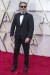 배우 호아킨 피닉스는 지속 가능성을 추구하는 브랜드 '스텔라 매카트니'의 턱시도를 입고 등장했다. [사진 EPA=연합뉴스]