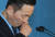 정봉주 전 의원이 11일 국회 정론관에서 기자회견 도중 울먹이고 있다. [연합뉴스]