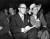 1947년 미국 하원의 비미위원회 청문회를 지켜보고 있는 할리우드 시나리오 작가 돌턴 트럼보(왼쪽). 증인 출석요구를 받자 '양심의 자유'를 내세워 출석하지 않았으며 이 때문에 블랙리스트에 포함돼 고초를 겪었다. [위키피디아]