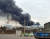 15일 오후 1시 31분께 충남 당진시 송악읍 동부제철 수처리 공장에 불이 나면서 검은 연기가 하늘로 치솟고 있다. [사진 당진시]