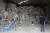 지난 해 11월 경북 영천시 대창면의 한 공장형 창고에서 무단으로 버려진 산업폐기물들을 공장관계자가 보고 있는 모습. [연합뉴스]
