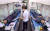 신종 코로나바이러스 감염증(코로나19)에 따른 혈액 수급난 해소를 위해 서울시 공무원들이 17일 오전 서울광장에 마련된 대한적십자사 헌혈 버스에서 헌혈하고 있다. [뉴스1]