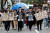 지난해 9월 21일 '9·21 기후위기 비상행동' 집회에 참가한 시민들이 '기후위기는 생존'이라는 메시지를 담은 퍼포먼스를 하며 행진하고 있다. [뉴스1]